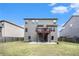 Backyard view with patio, fenced-in yard, and wooden deck at 6540 Muirfield Pt, Fairburn, GA 30213