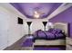 Elegant bedroom with vaulted ceiling, plush bedding, and modern lighting at 6540 Muirfield Pt, Fairburn, GA 30213