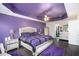 Luxurious bedroom with vaulted ceiling, plush bedding, and elegant furnishings at 6540 Muirfield Pt, Fairburn, GA 30213