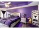 Stylish bedroom with dark wood floors, modern furnishings, and elegant decor at 6540 Muirfield Pt, Fairburn, GA 30213