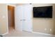 Bedroom featuring a closet, and a TV on the wall at 681 Nine Oaks Cir, Villa Rica, GA 30180