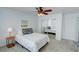 Well-lit bedroom with closet space and a ceiling fan at 102 Manley Ct, Woodstock, GA 30188