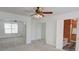 Spacious bedroom with mirrored closet doors and en-suite bathroom access at 102 Manley Ct, Woodstock, GA 30188