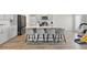 Modern kitchen featuring a large center island with bar seating, stainless appliances, and ample counter space at 1052 Bodega Loop, Locust Grove, GA 30248