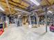 Unfinished basement with exposed ducts, utility connections, and storage at 3227 Heritage Way, Buford, GA 30519