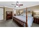 Well-decorated bedroom featuring a four-poster bed and private ensuite at 3227 Heritage Way, Buford, GA 30519