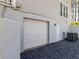 Attached two-car garage and exterior doors at rear of home at 3227 Heritage Way, Buford, GA 30519