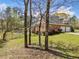 The back of the property shows a fenced yard, a private pool, and a brick exterior, complete with an attached garage at 5660 Trout Creek Dr, Douglasville, GA 30135