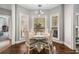 Bright breakfast nook with a bay window, round table, and views to the outside at 5660 Trout Creek Dr, Douglasville, GA 30135