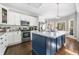 Contemporary kitchen featuring a center island, stainless steel appliances, and ample counter space for cooking and prep at 5660 Trout Creek Dr, Douglasville, GA 30135