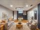 A large basement room includes a comfortable seating area, for versatile use at 710 Greystone Ne Park, Atlanta, GA 30306