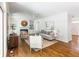Inviting living area with hardwood floors, built-in bookshelves, and a fireplace, perfect for relaxation and entertainment at 710 Greystone Ne Park, Atlanta, GA 30306