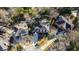 Aerial view of a home nestled among trees, showcasing the layout of the property in the neighborhood at 710 Greystone Ne Park, Atlanta, GA 30306