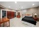 This is an image of a basement bedroom with a ceiling fan and a view of the closet at 710 Greystone Ne Park, Atlanta, GA 30306