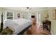 Cozy bedroom featuring a comfortable bed, a work desk, and ample natural light at 710 Greystone Ne Park, Atlanta, GA 30306