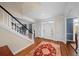 Welcoming foyer with hardwood floors and staircase at 710 Greystone Ne Park, Atlanta, GA 30306