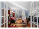 Cozy living room with hardwood floors, fireplace, and built-in bookshelves at 710 Greystone Ne Park, Atlanta, GA 30306