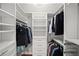 Organized walk-in closet with custom shelving and ample storage space at 710 Greystone Ne Park, Atlanta, GA 30306
