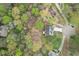 Picturesque neighborhood with lush greenery and well-spaced homes at 1007 Springharbor Walk, Woodstock, GA 30188