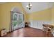 Bright living room featuring vaulted ceilings, large windows and beautiful hardwood flooring at 1007 Springharbor Walk, Woodstock, GA 30188