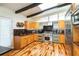 Bright eat-in kitchen with stainless appliances, and dark countertops offers sleek design at 1428 Brook Valley Ne Ln, Atlanta, GA 30324