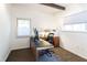 This home office offers a functional workspace with great natural light and a neutral color palette at 1428 Brook Valley Ne Ln, Atlanta, GA 30324