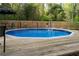 Relaxing backyard pool with a surrounding deck, perfect for entertaining and enjoying sunny days at 1428 Brook Valley Ne Ln, Atlanta, GA 30324