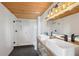 Bathroom featuring double sinks, modern lighting, tile floors and walk in shower at 3235 Roswell Ne Rd # 801, Atlanta, GA 30305