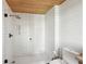 Modern bathroom with tile shower, shiplap walls, wood ceiling and modern fixtures at 3235 Roswell Ne Rd # 801, Atlanta, GA 30305
