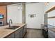 Well-appointed kitchen featuring a large island, stainless steel appliances, and wood countertops at 3235 Roswell Ne Rd # 801, Atlanta, GA 30305