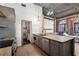 Contemporary kitchen with a large island, stainless steel appliances, and abundant cabinet space at 3235 Roswell Ne Rd # 801, Atlanta, GA 30305