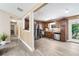 Modern kitchen featuring stainless steel appliances, and hardwood cabinets adjacent to a naturally lit doorway at 3385 Huntington Ct, Douglasville, GA 30134
