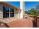 Spacious wooden deck with views of the backyard and mature trees at 3540 Owl Brow Ct, Cumming, GA 30028