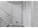 Light and airy entryway with stairs, door to the garage, and a closet at 3540 Owl Brow Ct, Cumming, GA 30028