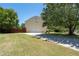 Exterior view of a home showcasing a two-car garage and a well-manicured lawn at 3540 Owl Brow Ct, Cumming, GA 30028