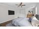 The primary bedroom offers hardwood floors and double closet space at 3540 Owl Brow Ct, Cumming, GA 30028