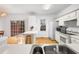Contemporary kitchen featuring a breakfast bar and stainless steel appliances at 3987 Howell Park Rd, Duluth, GA 30096