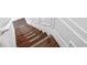 Staircase features wood treads with non-slip strips and white risers at 3987 Howell Park Rd, Duluth, GA 30096