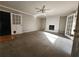 Inviting living room featuring plush carpet, a brick fireplace, and glass doors to another room at 2875 Oak Meadow Dr, Snellville, GA 30078