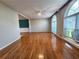 Spacious living room with hardwood floors and lots of natural light from the arch windows at 2875 Oak Meadow Dr, Snellville, GA 30078