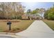 Lovely home with stone and siding, featuring a neatly kept lawn and a welcoming driveway at 135 Clear Spring Lane, Oxford, GA 30054