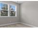 Bedroom with natural light and a lovely view of the trees at 4651 Eddibunn Se Dr, Smyrna, GA 30080