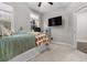 Bedroom with a large window and a ceiling fan at 4651 Eddibunn Se Dr, Smyrna, GA 30080
