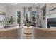 Cozy living room featuring a fireplace, modern furniture and plenty of natural light at 4651 Eddibunn Se Dr, Smyrna, GA 30080