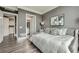 The comfy bedroom offers an ensuite bath, laundry, hardwood floors and neutral paint at 750 Park Ne Ave # 18S, Atlanta, GA 30326