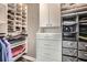 This organized closet has many shelves, shirts, pants, shoes, drawers and pull out baskets at 750 Park Ne Ave # 18S, Atlanta, GA 30326