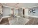 Dining room with modern lighting, sheer chairs and gray walls at 750 Park Ne Ave # 18S, Atlanta, GA 30326