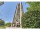 High-rise building with multiple balconies and a grand entrance at 750 Park Ne Ave # 18S, Atlanta, GA 30326
