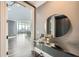 Foyer featuring a decorative mirror, console table and views of the living room at 750 Park Ne Ave # 18S, Atlanta, GA 30326