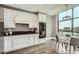 Charming kitchen nook with granite countertops, modern appliances, and city views at 750 Park Ne Ave # 18S, Atlanta, GA 30326